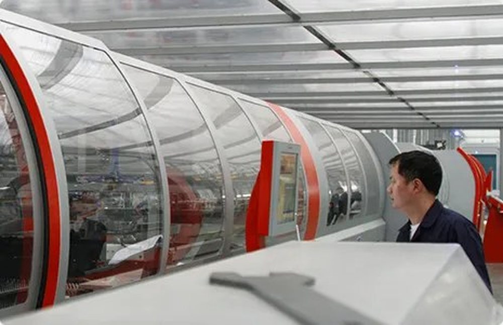 Escalator and moving-walkway assembly