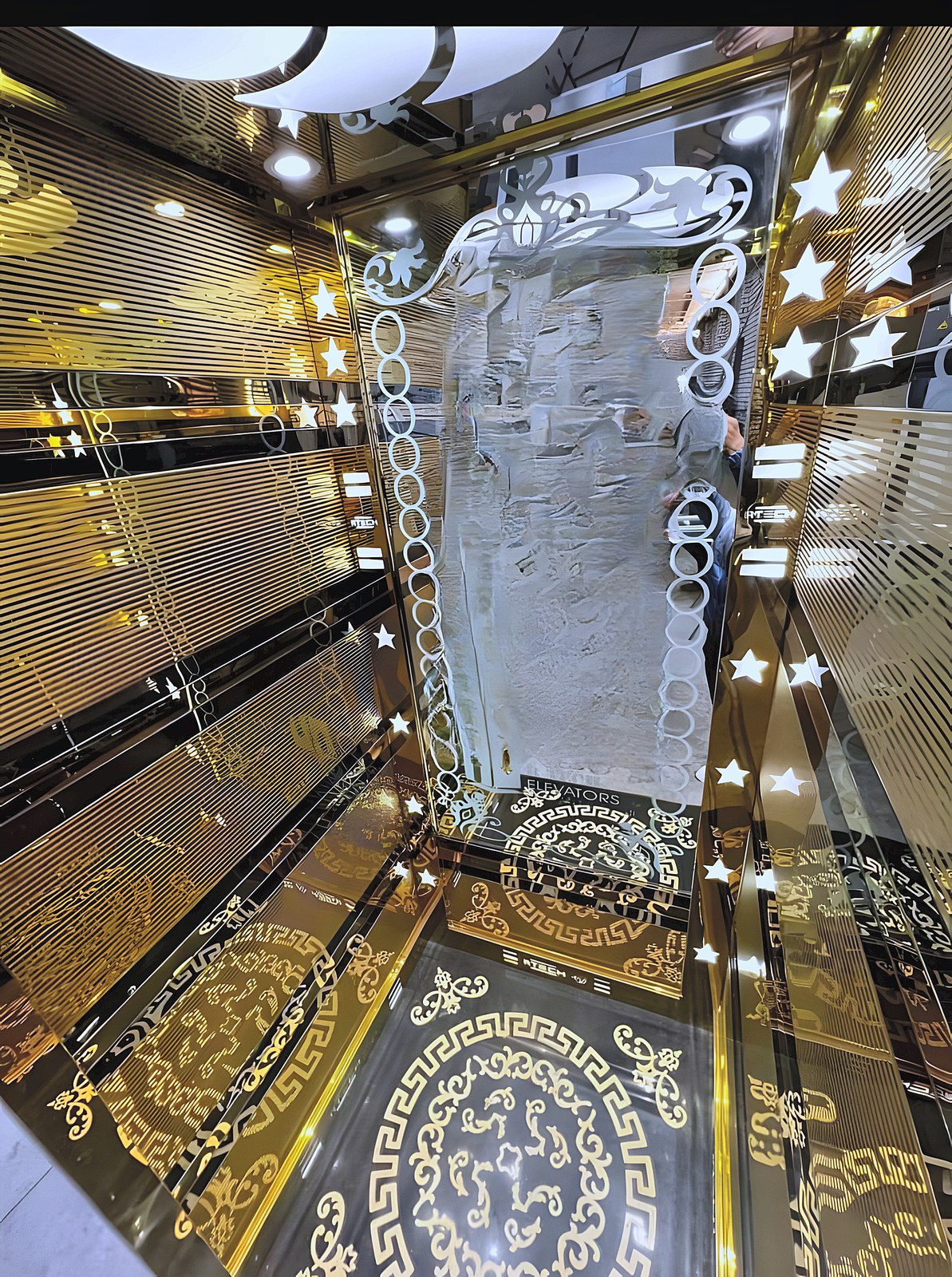 Etched gold cabin with a lit ceiling