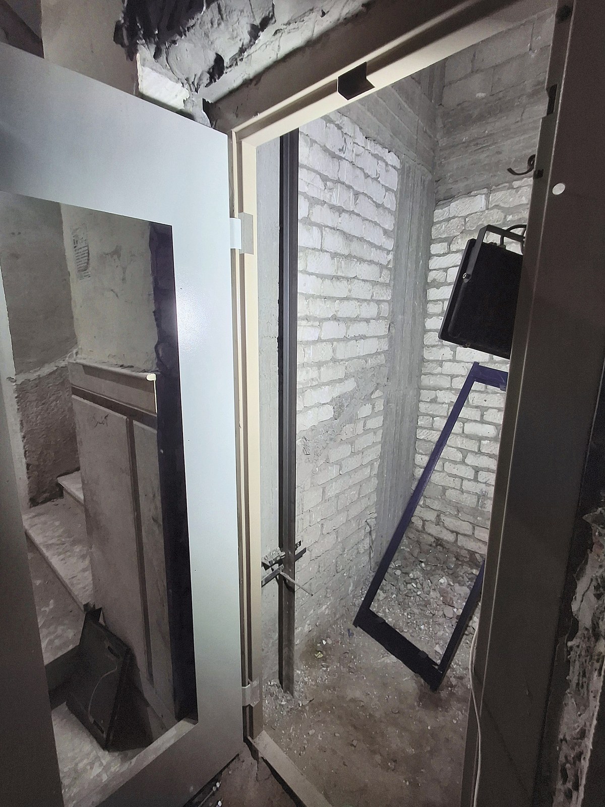 Fitting the landing-door frame