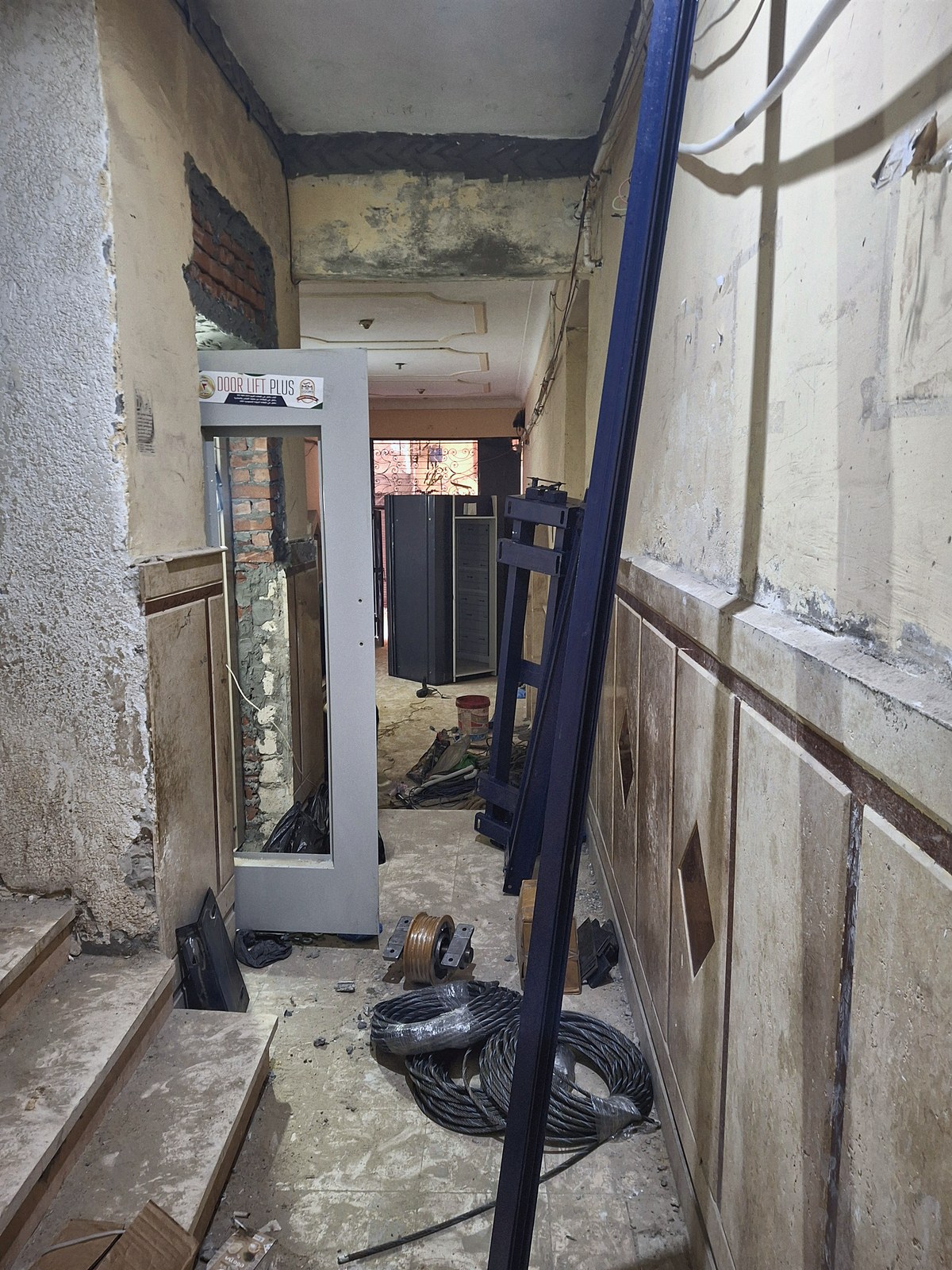 Landing-door frame — seen from the corridor