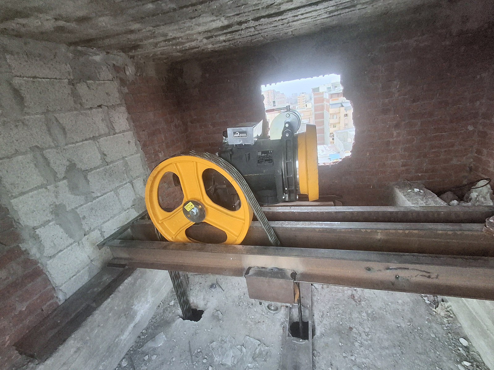 The traction machine on the machine-room beams