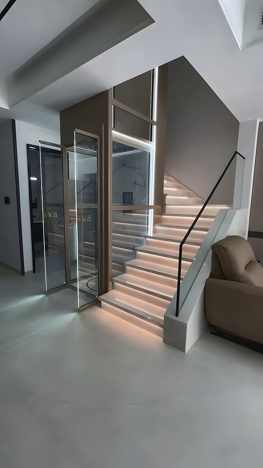 Glass lift in an interior lobby