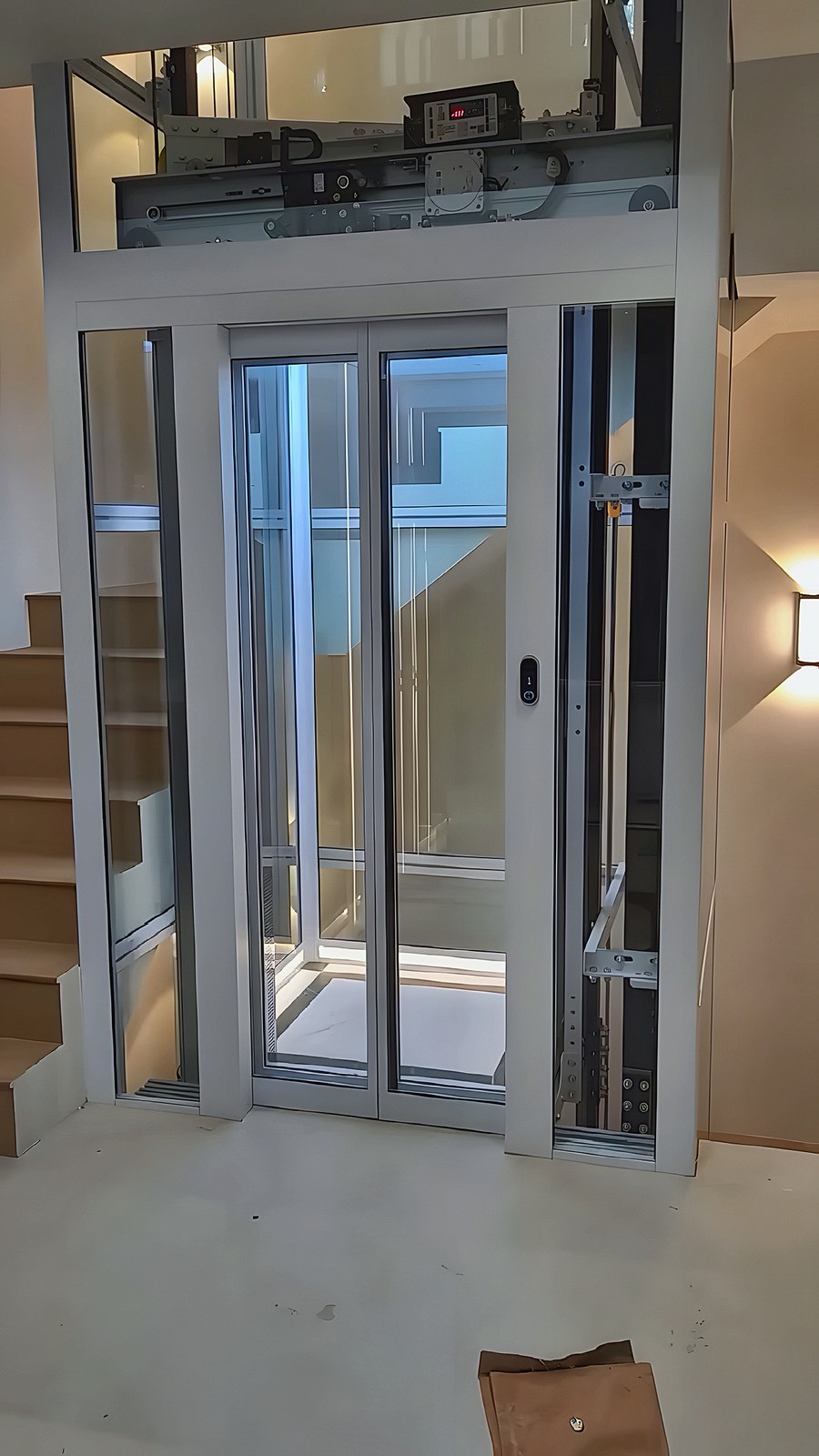 Glass lift with an aluminium frame after installation