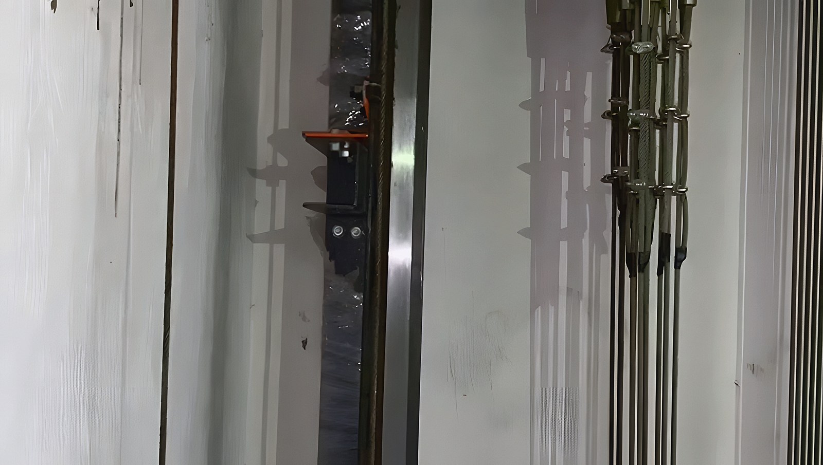 Rails and travelling cables inside the shaft